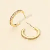 Fashnzfab 14k Gold Dipped Cz Stone Paved Mini Open Hoop Earrings In Gold