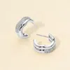 Fashnzfab 14k Gold Dipped Cz Stone Paved Wavy Mini Huggie Hoop Earrings In Silver