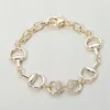 Fashnzfab 14k Gold Plated Cz Stone Paved Equestrian Bit Chain Bracelet Gold In Gold