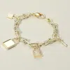 Fashnzfab 14k Gold Plated Cz Stone Paved Lock Key Charm Station Industrial Chain Link Bracelet Gold In Gold
