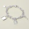 Fashnzfab 14k Gold Plated Cz Stone Paved Lock Key Charm Station Industrial Chain Link Bracelet Rhodium In Multi