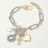 Fashnzfab 14k Gold Plated Two Tone Cz Stone Paved Heart Medallion Cross Pearl Charm Chunky Oval Chain Bracelet In Multi