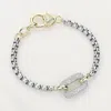 Fashnzfab 14k Gold Plated Two Tone Cz Stone Paved Open Rectangle Accented Bracelet Two Tone In Multi