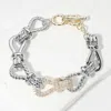 Fashnzfab 14k Gold Plated Two Tone Cz Stone Paved Rope Knot Link Toggle Bracelet In Metallic
