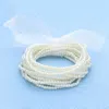 Fashnzfab 15pcs - Pearl Beaded Stretch Multi Layered Bracelets In White