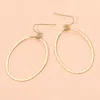 Fashnzfab 18k Gold Dipped Brass Metal Hammerd Open Oval Dangle Earrings In Gold