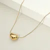 Fashnzfab 18k Gold Dipped Stainless Steel Bean Pendant Necklace In Gold