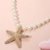 Fashnzfab 18k Gold Dipped Textured Metal Starfish Pendant Accent Pearl Statement Necklace In Multi