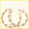 Fashnzfab 18k Gold Filled Hypoallergenic Twisted Open Hoop Earrings In Gold