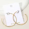 Fashnzfab 18k Gold Over Brass Hammered Skinny Hoop Earrings - Gold In Gold