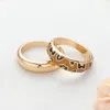 Fashnzfab 2pcs - Enamel Leopard Patterned Metal Band Mixed Rings - Tan In Gold