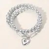 Fashnzfab 2pcs - Metal Heart Charm Pointed Ball Beaded Stretch Multi Layered Bracelets Rhodium In Multi