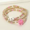 Fashnzfab 3pcs - Christmas Gift Bow Accented Metal Ball Stretch Bracelets Multi, Pink In Multi