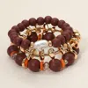 Fashnzfab 3pcs - Pearl Accent Metal Wooden Ball Beaded Stretch Multi Layered Bracelets In Brown