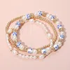 Fashnzfab 3pcs - Floral Ceramic Ball Pearl Metal Ball Beaded Stretch Stackable Multi Layered Bracelets In Gold