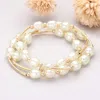 Fashnzfab 3pcs - Triple Freshwater Pearl Beaded Station Stretch Multi Layered Bracelets Cream, Gold In Multi