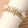 Fashnzfab 4pcs - Metal Faceted Beaded Stretch Multi Layered Bracelets Cream, Worn Gold In Multi