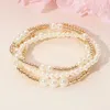 Fashnzfab 4pcs - Pearl Metal Ball Beaded Stretch Multi Layered Bracelets In Multi
