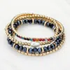 Fashnzfab 4pcs - Pearl Pointed Rhinestone Metal Ball Faceted Beaded Stretch Multi Layered Bracelets Blue, Worn In Multi