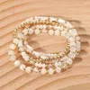 Fashnzfab 5pcs - Mixed Beaded Stretch Multi Layered Bracelets In White