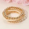 Fashnzfab 5pcs - Pearl Metal Ball Beaded Stretch Multi Layered Bracelets In Gold