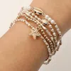 Fashnzfab 5pcs - Starfish Seashell Charm Pearl Seed Beaded Stretch Multi Layered Bracelets In Brown