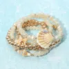 Fashnzfab 5pcs - Starfish Shell Accent Faceted Beaded Stretch Multi Layered Bracelets In Sand
