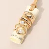 Fashnzfab 5pcs - Modern Pearl Accent Stackable Ring Set In Gold