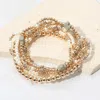 Fashnzfab 7pcs - Cross Pearl Metal Ball Beaded Stretch Multi Layered Bracelets In Gold