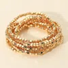 Fashnzfab 9pcs - Metallic Beaded Stretch Multi Layered Bracelets In Gold