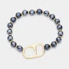 Fashnzfab Abstract Metal Accented Faceted Beaded Stretch Bracelet Jet Black In Black