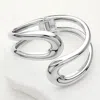 Fashnzfab Abstract Metal Loop Bypass Hinged Bracelet Rhodium In Multi