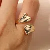 Fashnzfab Abstract Open Adjustable Stainless Steel Ring In Gold
