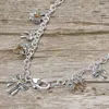 Fashnzfab Antique Metal Bow Charm Station Necklace In Silver