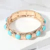 Fashnzfab Bead Embellished Hammered Metal Stretch Bracelet Turquoise, Worn Gold In Multi