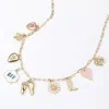 Fashnzfab Bff Message Flower Heart Bow Mushroom Boot Charm Station Paperclip Chain Necklace In Gold