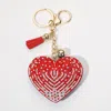 Fashnzfab Bling Heart Tassel Keychain In Red