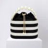 Fashnzfab Bling Pearl Top Handle Drawstring Box Crossbody Bag In Black