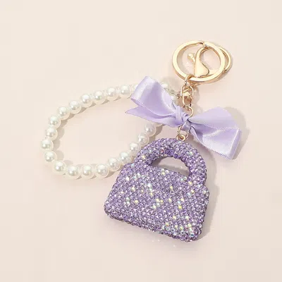Fashnzfab Bling Studded Bow Handbag Charm Pearl Beaded Wristlet Strap Bag Charm Keychain In Purple