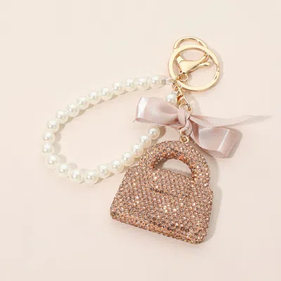 Fashnzfab Bling Studded Bow Handbag Charm Pearl Beaded Wristlet Strap Bag Charm Keychain In Brown
