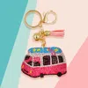 Fashnzfab Bling Studded Bus Tassel Keychain In Multi