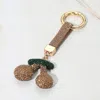 Fashnzfab Bling Studded Cherry Keychain / Bag Charm In Gold