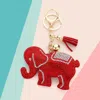 Fashnzfab Bling Studded Elephant Tassel Keychain In Red
