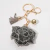 Fashnzfab Bling Studded Flower Tassel Keychain In Black