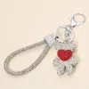 Fashnzfab Bling Studded Heart Accent Teddy Bear Charm Wrist Strap Bag Charm Keychain In Silver