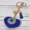 Fashnzfab Bling Studded Heart Evil Eye Tassel Keychain / Bag Charm In Blue