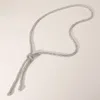 Fashnzfab Bling Studded Knot Pointed Long Necklace In Silver