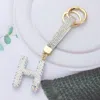 Fashnzfab Bling Studded Monogram Initial H Keychain In Gold