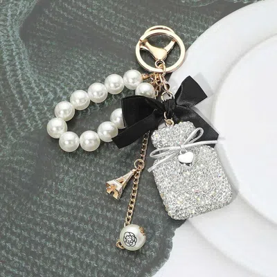Fashnzfab Bling Studded Perfume Bottle Bow Pearl Wristlet Keychain Bag Charm In Multi