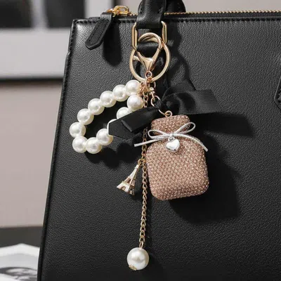 Fashnzfab Bling Studded Perfume Bottle Bow Pearl Wristlet Keychain Bag Charm In Yellow